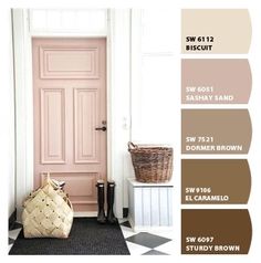 the front door is painted pink and brown