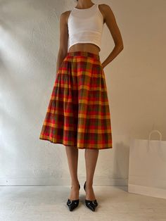 - Vintage red plaid midi skirt - Feels like a structured poly - Silky lining - No tags - Small  Waist: 27" Length: 27.5" Retro Red Lined Skirt, Retro Red Cotton Skirt, Vintage Plaid Summer Skirt, Red Plaid Midi Skirt, Vintage Plaid Cotton Skirt, Small Waist, Red Plaid, Midi Skirt, Womens Skirt