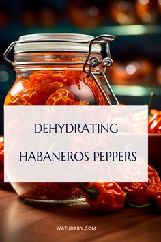 a jar filled with red peppers sitting on top of a wooden table