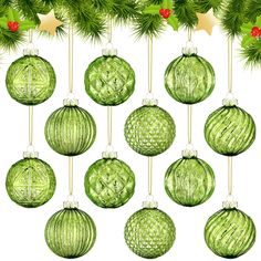 twelve green glass ornaments hanging from a christmas tree