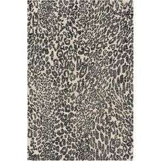 a black and white rug with an animal print pattern