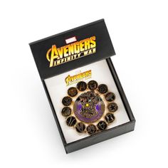 an avengers pin set in a box