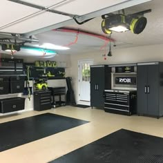 a garage filled with lots of black and yellow tools