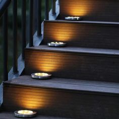 some lights that are on the steps