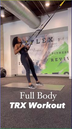 a woman is doing pull - up exercises in the gym with text that reads full body trx workout