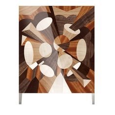 an art piece made out of wood with circles and shapes on the surface in brown, white