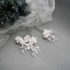 Wedding flower hairpins - natural romantic style. The hairpins are made of white polymer clay flowers and clear crystal beads. Perfect for wedding, other events. Invite florals to your wardrobe with this art hair accessories!  Also great for Bridesmaids. Pick the necklace, earrings and headpieces for bride, bridesmaids and flower girls in the same theme in my store. Each flowers is handcrafted. Made by me completely by hand from polymer clay.  No mold Used! The Flowers of polymer clay are waterp Rustic Wedding Jewelry, Wedding Hair Pins Crystal, Crystal Wedding Hair Accessories, Bridal Hair Pins Pearl, Bridesmaid Hair Pieces, Floral Wedding Hair, Bridesmaid Hair Pins, Bridesmaids Hair, Art Hair