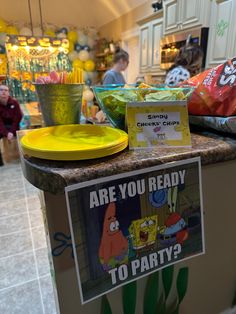 there is a sign that says are you ready to party? on the counter in this store