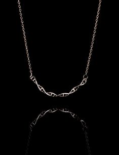 This dainty, elegant DNA double helix necklace is designed to celebrate Barbara McClintock's achievement in genetics research.  Our DNA has just four different types of base molecules but has billions of them in a sequence that is completely unique to you! That is because our genes, which are sections of DNA that contain the unique set of instructions to produce one specific molecule in your body.  Do you know that we have jumping genes?  In the 1930s and 40s, Barbara McClintock's work showed th Biomedical Scientist, Barbara Mcclintock, Dna Necklace, Molecule Necklace, Women In Stem, Scientist Gifts, Jump Around, Double Helix, Necklace Sizes