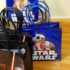 the star wars merchandise is on display in bags