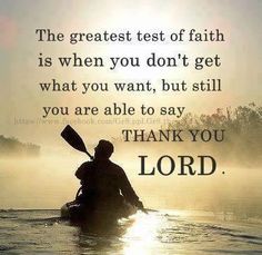 a man in a kayak with the words, the greatest test of faith is when you don't get what you want, but still you are able to say