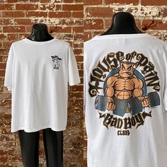 "*1993 House Of Pain Bad Boy Club T-Shirt *Vintage 90s Bad Boy Club weightlifting surf tee Notes: *Great vintage condition; relatively wide neck opening; no flaws to note *Single stitch sleeve Double stitch hem Bad Boy Club tee; secondary tag cut out; 100% Cotton; tag size Large *Fits like men's size XXL Measurements: Pit to pit: 25.5\"  Length, shoulder to bottom: 29\"  *Item is vintage and sold as is *Feel free to message me for any additional details  *Please explore my store for more! Combin House Of Pain, 90s Culture, Skate Shirts, Culture Fashion, Brand Ideas, Surf Tee, Club T Shirt, Double Stitch, 90s Streetwear