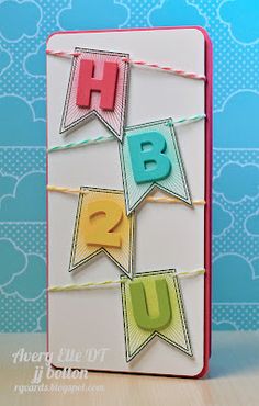 a handmade birthday card with bunting flags and the words happy b u on it