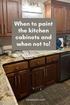 a kitchen with brown cabinets and granite counter tops that says when to paint the kitchen cabinets and when not to