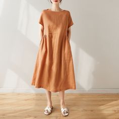 "Cool and comfortable for hot summer days, this natural linen dress is elegant and stylish.    It is a wonderful wardrobe staple that's a timeless classic you'll wear again and again.Pure natural linen materials, comfortable, breathable, refreshing and soft fabric. All our items are Tailored and Handmade and Made to Order ,I can make Any Size . I design new styles every week, please collect my store. I believe that you will meet your favorite styles. ★★FEATURES Linen 55% + Cotton 45% ( Medium We Solid Linen Maxi Dress For Vacation, Beige Linen Midi Dress For Vacation, Casual Apricot Short Sleeve Midi Dress, Casual Apricot Midi Dress With Short Sleeves, Solid Summer Linen Dress For Vacation, Solid Linen Dress For Summer Vacation, Solid Color Linen Summer Dress For Daywear, Summer Linen Dress For Vacation In Solid Color, Solid Midi-length Linen Dress For Beach