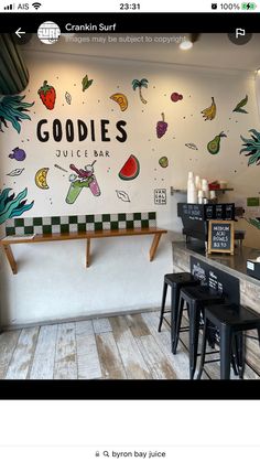 an image of a restaurant with food painted on the wall