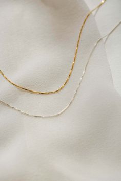 Durable, timeless and tangle-resistant, our box chain is a classic—and for good reason. The perfect base for your favorite GLDN pendants and charms or a simple, sleek addition to your stack. Delicate Box Chain Jewelry For Everyday, Everyday Fine Jewelry Box Chain Necklace, Minimalist 14k Gold Box Chain Necklace, Timeless Box Chain Necklace As A Gift, Delicate Box Chain Necklace For Everyday, Dainty Jewelry With Rectangular Box Chain Links, Minimalist Tarnish Resistant White Gold Chain Necklace, Minimalist Tarnish-resistant White Gold Chain Necklace, Dainty Box Chain Necklace