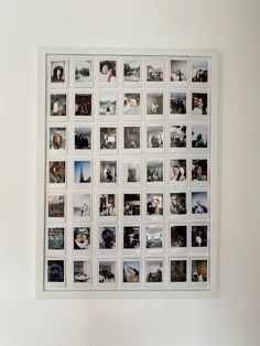 a white wall with many pictures hanging on it's side and the bottom half is covered in photos