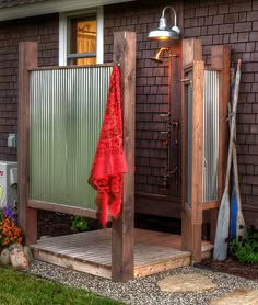 an outdoor shower that will help you let loose water in your house and keep it clean