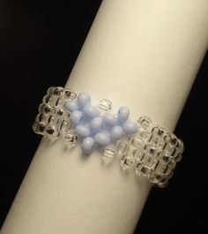 a close up of a bracelet with beads on it