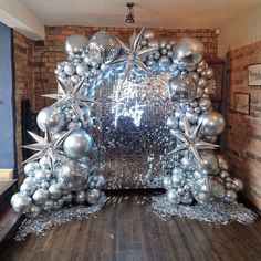 a room filled with lots of shiny silver decorations