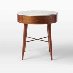 a small wooden table with a marble top and two drawers on one side, against a white background