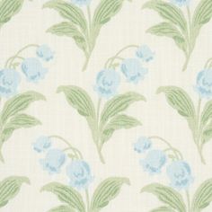 a blue and green flower pattern on white fabric