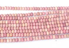 the beads are pink and brown in color