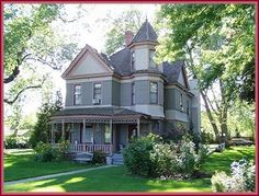 an old victorian style house in the suburbs