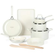 an assortment of cookware including pots and pans