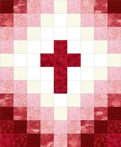 a red and white patchwork quilt with a cross on it's center piece