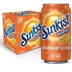 an orange soda can next to a box of sunskiet orange soda on a white background