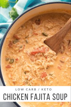 low carb / keto chicken fajita soup in a blue pot with a wooden spoon