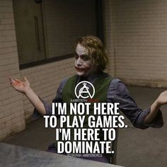 the joker is holding his hands out and saying i'm not here to play games i'm here to dominate