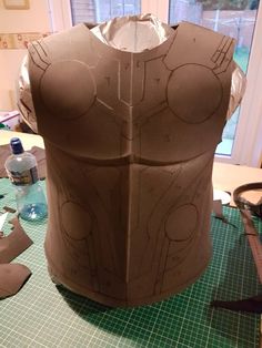 there is a paper mache made to look like a man's torso