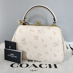 🍀NWT Coach X Disney Dalmatians Frame Bag Floral Print Chalk Limited Edition | eBay Coach Disney Tote, Disney Coach Bags, Coach Floral Bag, Coach Disney Bags, Disney Coach, Coach X Disney, Chloe Bags Handbags, Coach Disney, Disney Purse