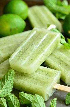 green popsicles with mints and limes in the background