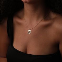 "Unlock the magic of memories and showcase your personalized flair with our Custom Support Number Necklace. A blend of sentiment and style, this exceptional piece doubles as the perfect accessory for sports enthusiasts and a touching memento for any special someone. 🌟 Personalize with Meaning: Whether it's a basketball, soccer, or any sports number, a significant year, or a lucky digit, our necklace captures the essence of your cherished moments. 🏀 Celebrate Your Sport: Basketball Necklace to Soccer Number Gifts, carry your athletic spirit close to your heart or gift it to the athlete in your life. 🎂 Every Occasion Embellishment: From Mother's Day Gift to Graduation Gift or a Wedding Gift, this Number Necklace Gold is versatile for any celebratory event. 💍 Exquisite Craftsmanship: Each Basketball Necklace, Year Necklace, Number Jewelry, Number Gifts, 16 Necklace, Number Necklace, Gold Number, Gift For Sister, Lucky Number