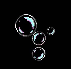 three bubbles floating in the air on a black background