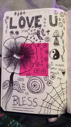 an open notebook with drawings on it and the words love up written in pink ink