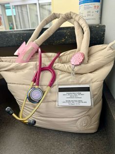 a purse with a stethoscope on top of it