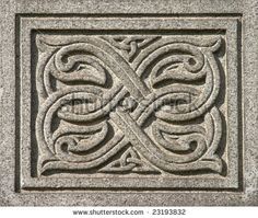 a stone block with an intricate design on it