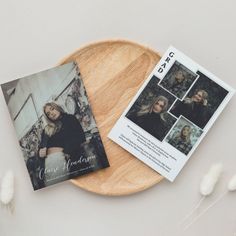 a magazine sitting on top of a wooden plate