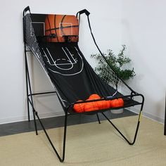 a chair with a basketball net on it in front of a wall