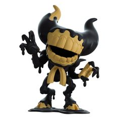 an action figure that looks like a demon with big eyes and fangs on it's face