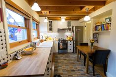 the kitchen is clean and ready to be used for cooking or eating, as well as other things in the house