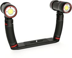 two flashlights are attached to the handlebars of a bike light stand on a white background