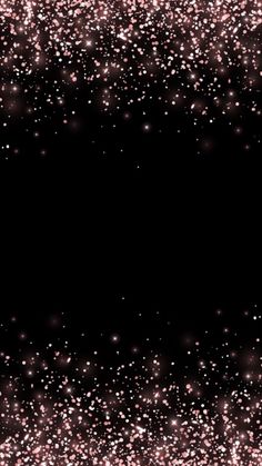 a black and pink glitter background with space for text