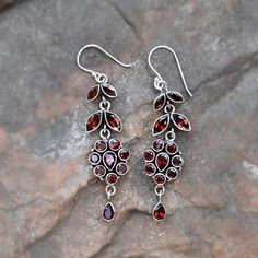 This One of a kind earring is adorned with beautiful Garnet Gemstone set in sterling silver. About gemstone- Garnet is intense red colour stone resembling the glistening, deep red seeds of the fruit. This red stone is associated with true friendship, devotion, loyalty, self esteem, success and passion. Garnet protects from negativity and warn off evil spirits and leads way to spiritual world. Wearing Garnet stone promotes good health and enhances body strength, vigour and endurance. jewellery works to balance mind and emotions and giving new ways to new path of abundance and vitality. Garnet has ability to bring about transformation in lives. Add this beautiful one little thing of galactic shine in your accessories to make you feel unique and to transform your lives.Perfect for any kind of Red Garnet Earrings, Handmade Silver Earrings, Boho Drop Earrings, January Birthstone Jewelry, Wedding Earring, Earrings Teardrop, Jewelry Words, Earring Handmade, Silver Earrings Handmade