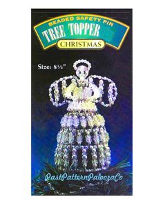 a lighted christmas tree topper in the shape of a woman